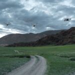 A drone flying over a lush forest, monitoring wildlife and conserving natural habitats.